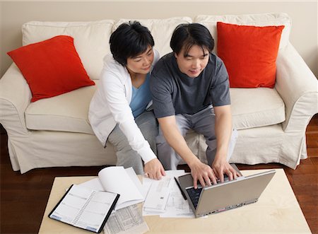 Couple Working at Home Stock Photo - Premium Royalty-Free, Code: 600-00934055