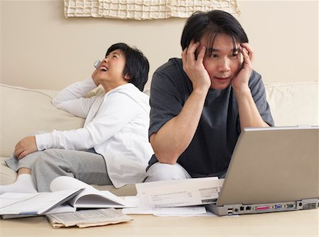 Couple in Living Room Stock Photo - Premium Royalty-Free, Code: 600-00934056