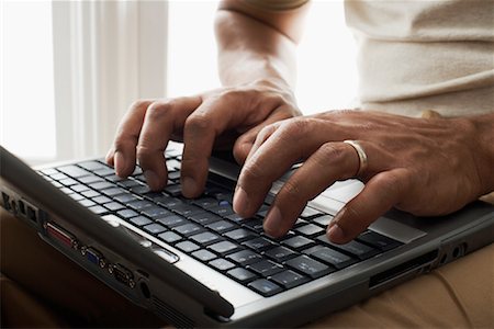 Man Working on Laptop Stock Photo - Premium Royalty-Free, Code: 600-00934110