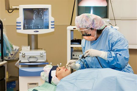 female doctor glove women only - Endoscopic Sinus Surgery being Performed on Patient Stock Photo - Premium Royalty-Free, Code: 600-00934178