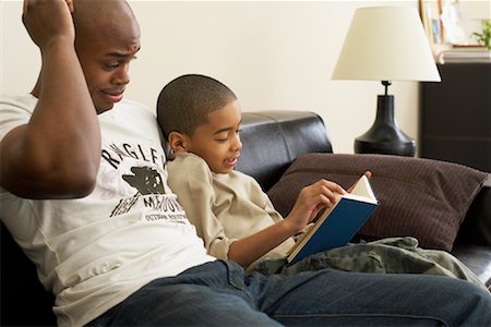 simsearch:600-00033212,k - Father and Son Reading Stock Photo - Premium Royalty-Free, Code: 600-00934293