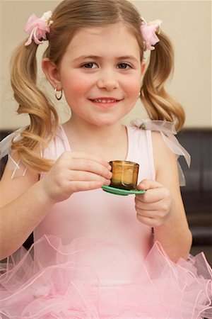 Girl Playing Tea Party Stock Photo - Premium Royalty-Free, Code: 600-00934406