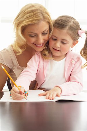 simsearch:600-00947977,k - Mother Helping Daughter with Homework Stock Photo - Premium Royalty-Free, Code: 600-00934428