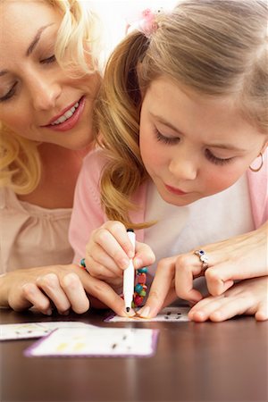 Girl Drawing with Mother Stock Photo - Premium Royalty-Free, Code: 600-00934432