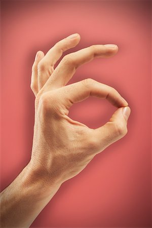 Person's Hand Making OK sign Stock Photo - Premium Royalty-Free, Code: 600-00934713