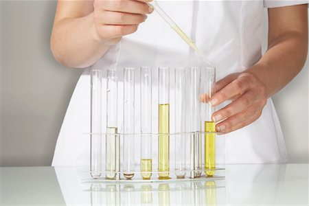 simsearch:700-00166715,k - Doctor Using Test Tubes Stock Photo - Premium Royalty-Free, Code: 600-00935097