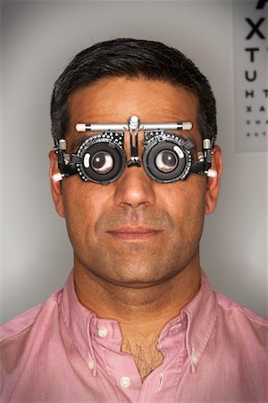 simsearch:649-07063767,k - Man Receiving Eye Exam Stock Photo - Premium Royalty-Free, Code: 600-00935090