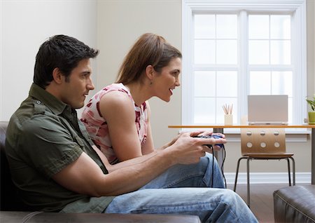 simsearch:600-01407140,k - Couple Playing Video Game Stock Photo - Premium Royalty-Free, Code: 600-00933813