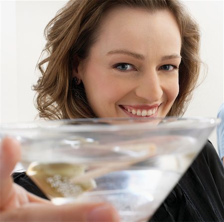 Woman Holding Martini Stock Photo - Premium Royalty-Free, Code: 600-00933829