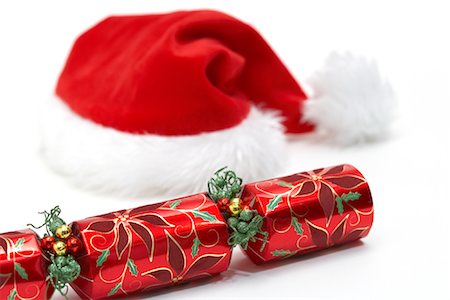party de noël - Christmas Cracker et Santa Hat Photographie de stock - Premium Libres de Droits, Code: 600-00947757