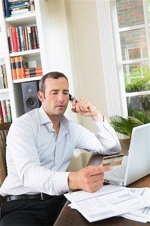 Homme travaillant à domicile Photographie de stock - Premium Libres de Droits, Code: 600-00947955