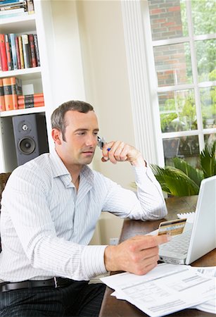 simsearch:600-01295795,k - Man Working from Home Stock Photo - Premium Royalty-Free, Code: 600-00947956