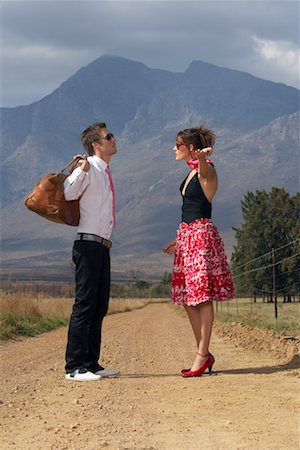 Couple Fighting On Country Road Stock Photo - Premium Royalty-Free, Code: 600-00948066
