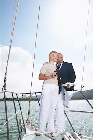 simsearch:600-00948196,k - Couple Standing on Boat Foto de stock - Sin royalties Premium, Código: 600-00948199