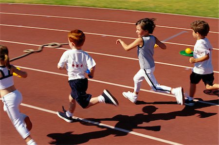simsearch:600-01764842,k - Kids Running Egg and Spoon Race Stock Photo - Premium Royalty-Free, Code: 600-00948320