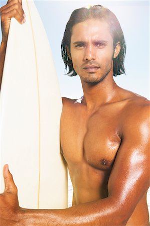 simsearch:700-00547097,k - Portrait d'homme avec planche de surf Photographie de stock - Premium Libres de Droits, Code: 600-00948495