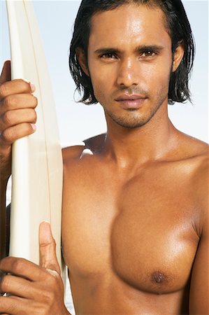 simsearch:700-00547097,k - Portrait d'homme avec planche de surf Photographie de stock - Premium Libres de Droits, Code: 600-00948499