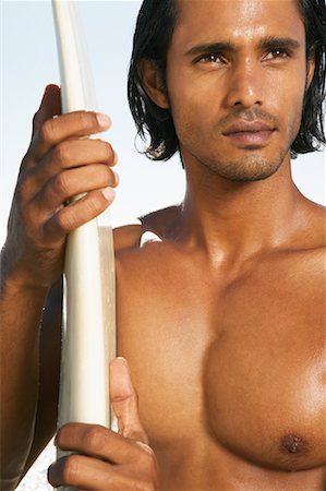 simsearch:700-00547097,k - Portrait d'homme avec planche de surf Photographie de stock - Premium Libres de Droits, Code: 600-00948500