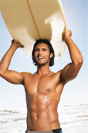 simsearch:700-00547097,k - Portrait d'homme avec planche de surf Photographie de stock - Premium Libres de Droits, Code: 600-00948502