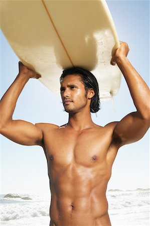 simsearch:700-00547097,k - Portrait d'homme avec planche de surf Photographie de stock - Premium Libres de Droits, Code: 600-00948503