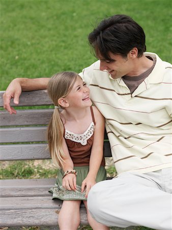 portrait of family on park bench - Portrait Father and Daughter Stock Photo - Premium Royalty-Free, Code: 600-00948625