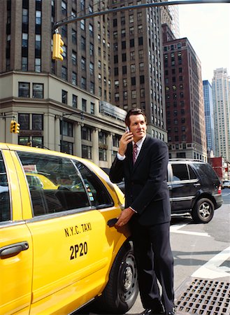 simsearch:600-00948902,k - Businessman Getting into Taxi Foto de stock - Sin royalties Premium, Código: 600-00948928