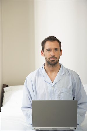 Man Using Laptop Computer Stock Photo - Premium Royalty-Free, Code: 600-00949086