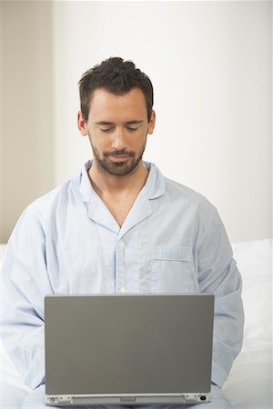 Man Using Laptop Computer Stock Photo - Premium Royalty-Free, Code: 600-00949087