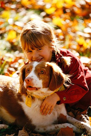 simsearch:700-00795908,k - Portrait of Girl Hugging Dog Photographie de stock - Premium Libres de Droits, Code: 600-00954393