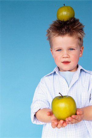 Portrait of Boy with Apples Stock Photo - Premium Royalty-Free, Code: 600-00954426