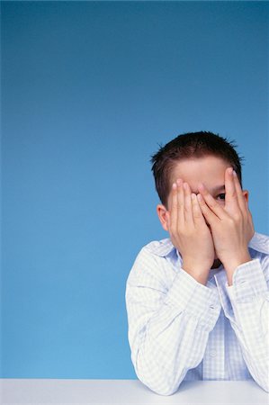 preteens fingering - Boy Covering His Face Stock Photo - Premium Royalty-Free, Code: 600-00954440