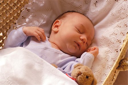 sleeping cute baby with teddy