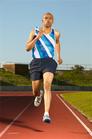 sweaty look of determination - Runner Stock Photo - Premium Royalty-Free, Code: 600-00984010