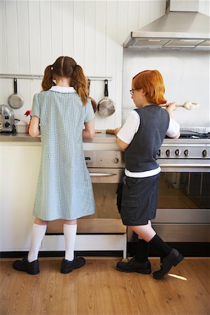 Brother and Sister in Kitchen Stock Photo - Premium Royalty-Free, Code: 600-00984185