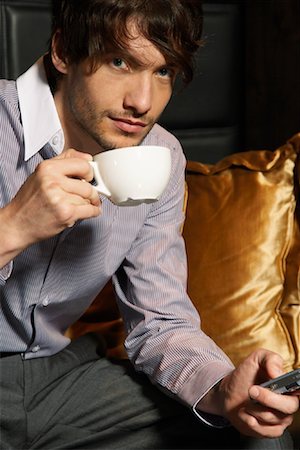 serious hip businessman - Businessman Drinking Coffee Stock Photo - Premium Royalty-Free, Code: 600-00984346