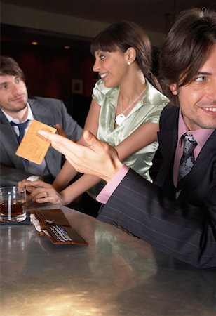 simsearch:600-03075833,k - Businessmen and Woman in Bar Stock Photo - Premium Royalty-Free, Code: 600-00984376