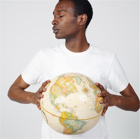 simsearch:600-00983698,k - Portrait of Man Holding Globe Stock Photo - Premium Royalty-Free, Code: 600-00983693