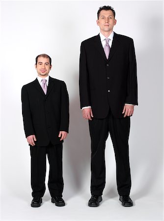 different concept - Short and Tall Businessmen Stock Photo - Premium Royalty-Free, Code: 600-00983729