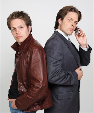 sibling portrait two people serious - Portrait of Twin Brothers Stock Photo - Premium Royalty-Free, Code: 600-00983755