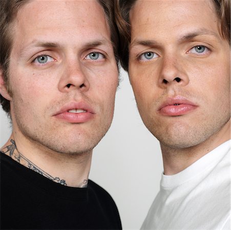 sibling portrait two people serious - Portrait of Twin Brothers Stock Photo - Premium Royalty-Free, Code: 600-00983764