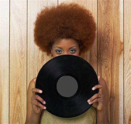 record album - Woman Holding Record Stock Photo - Premium Royalty-Free, Code: 600-00983908