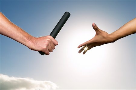 simsearch:700-00044954,k - Hands Passing Baton Stock Photo - Premium Royalty-Free, Code: 600-00983926