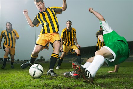 simsearch:400-04495626,k - Soccer Player Shooting Fotografie stock - Premium Royalty-Free, Codice: 600-00983991