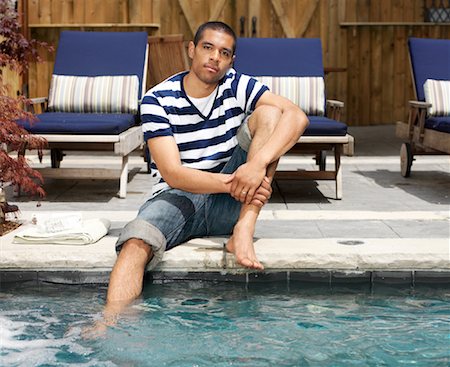 deckchair garden - Man Relaxing by Pool Stock Photo - Premium Royalty-Free, Code: 600-01014859