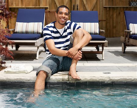 deckchair garden - Man Relaxing by Pool Stock Photo - Premium Royalty-Free, Code: 600-01014860