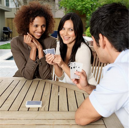 People Playing Cards Stock Photo - Premium Royalty-Free, Code: 600-01014957