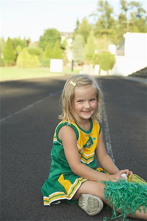 Girl Dressed as Cheerleader Stock Photo - Premium Royalty-Free, Code: 600-01015106