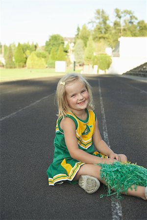 Girl Dressed as Cheerleader Foto de stock - Sin royalties Premium, Código: 600-01015107