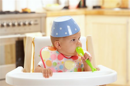 simsearch:600-01015388,k - Baby in High Chair Stock Photo - Premium Royalty-Free, Code: 600-01015374