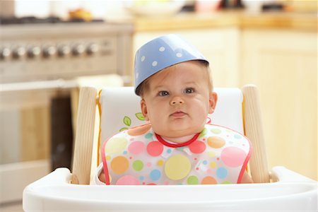 simsearch:600-01015388,k - Baby in High Chair Stock Photo - Premium Royalty-Free, Code: 600-01015375